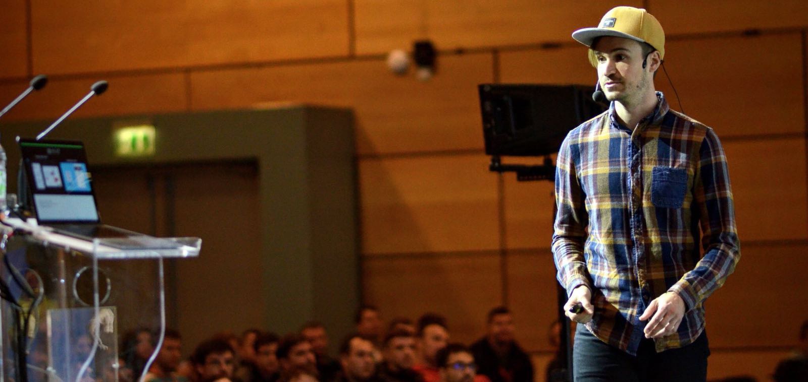 Christoph speaking at a conference.